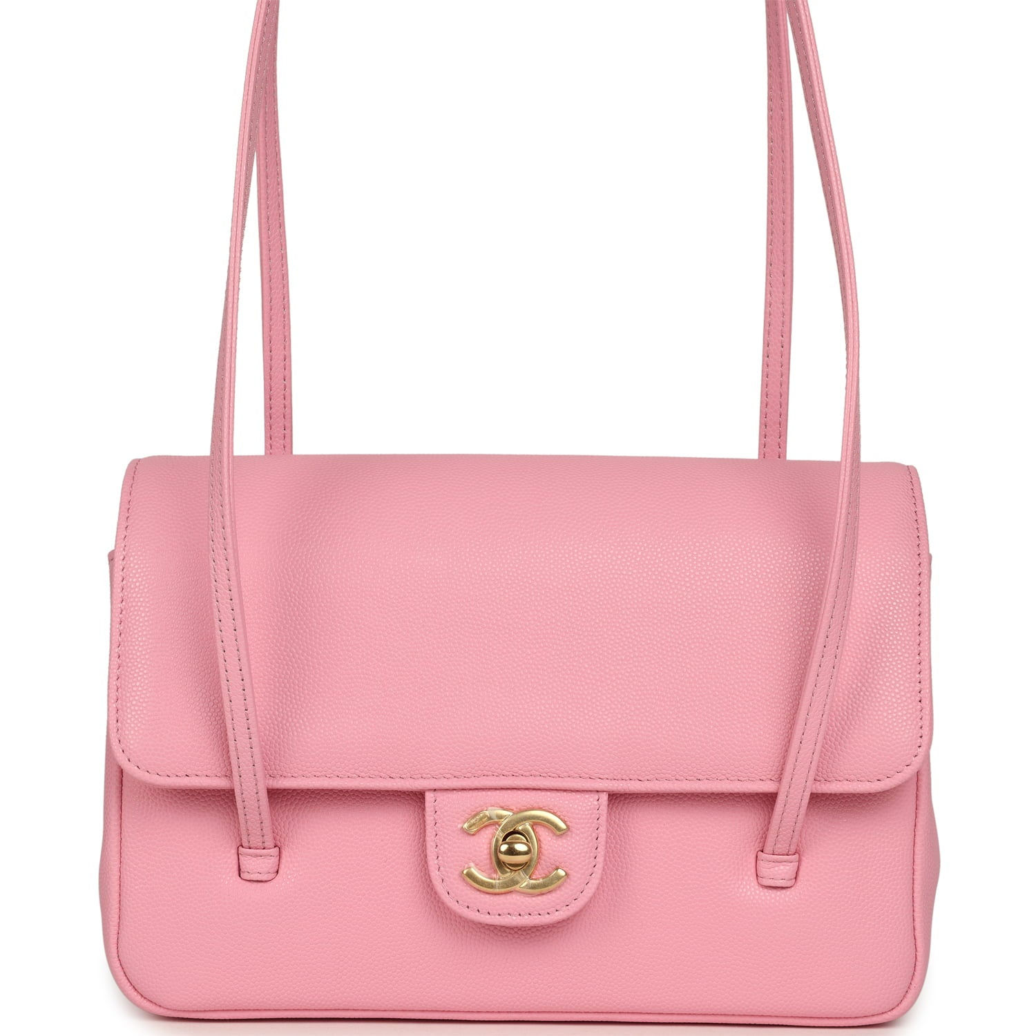 Front view of a bubblegum pink caviar Chanel flap bag with gold turnlock and long straps