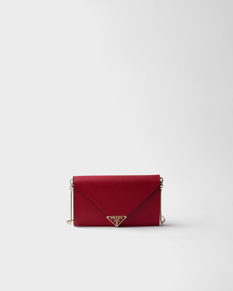 Prada triangle logo mini bag in fiery red Saffiano leather – front view