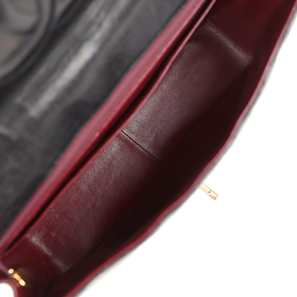 Thumbnail: Interior view showing the burgundy leather lining and zipped compartment