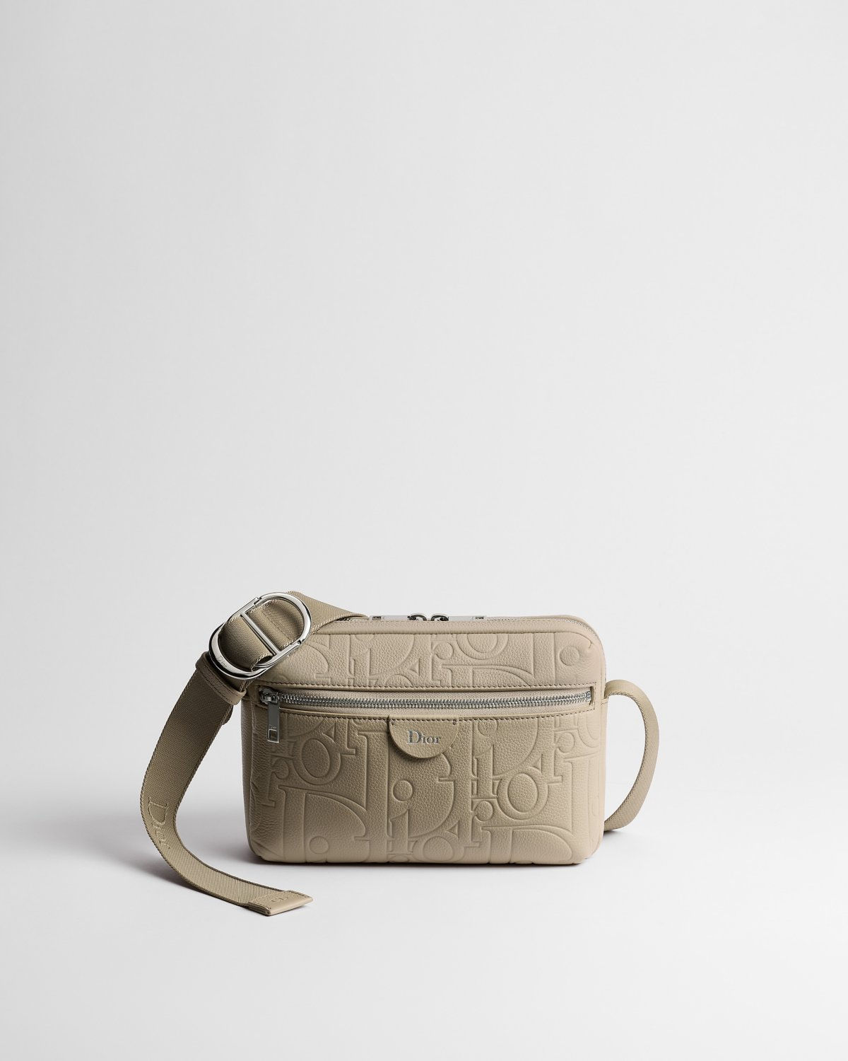 Dior Rider zipped messenger bag in beige Dior Gravity leather – front view