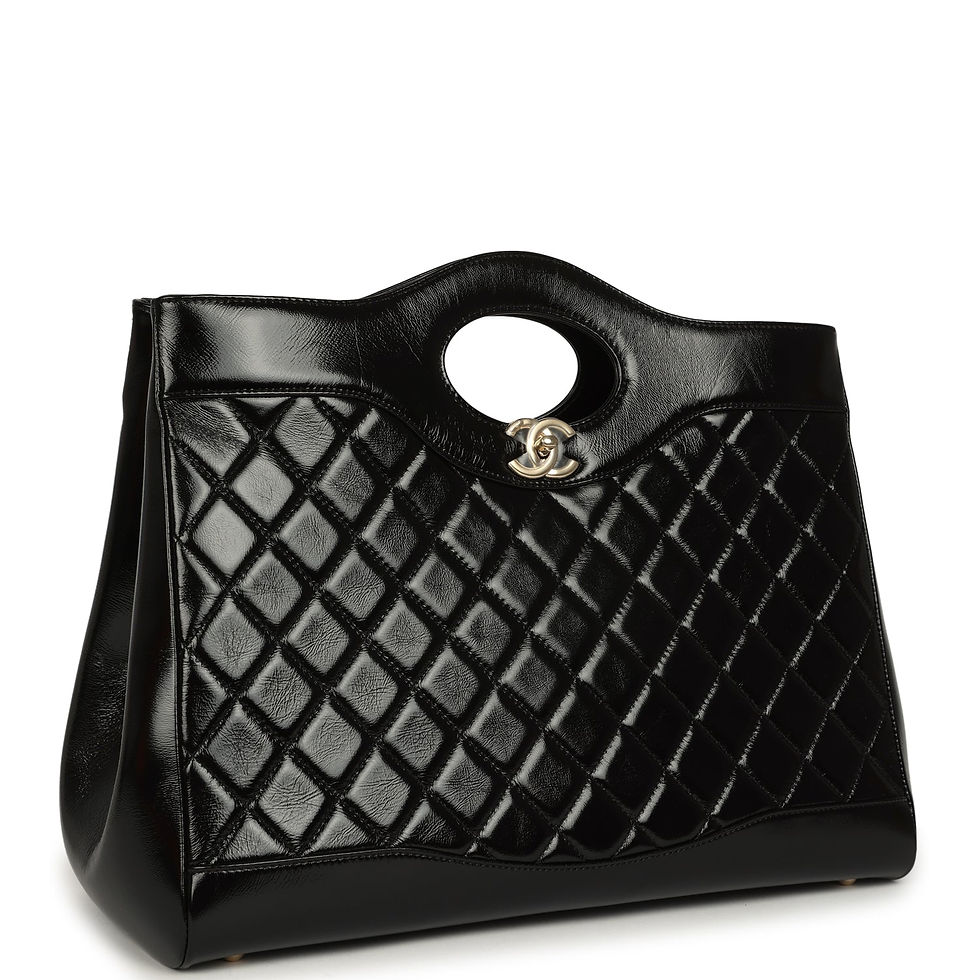 Angled front view of the black 31 Shopper showing the gold-tone CC turn-lock