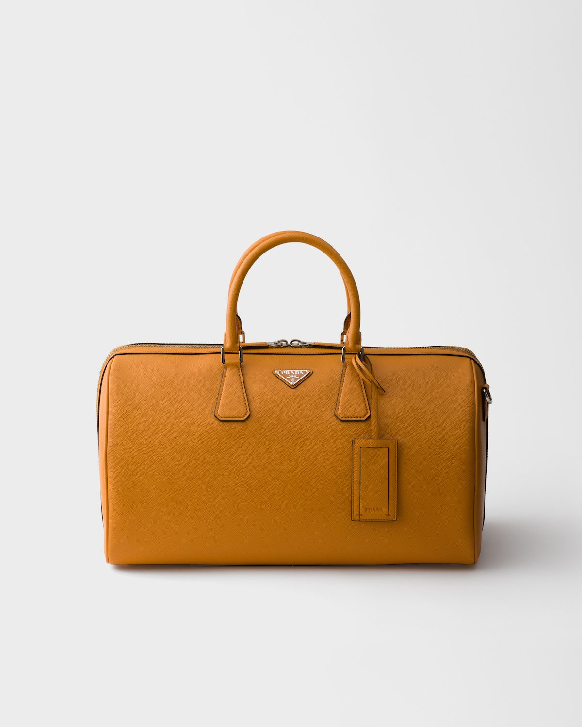 Prada travel bag in amber Saffiano leather – front view