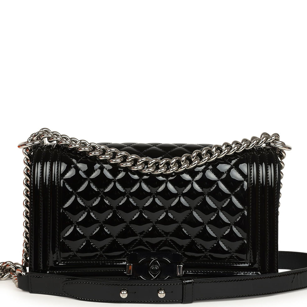 Chanel Medium Boy Bag in high-shine black patent leather with silver-tone chain strap