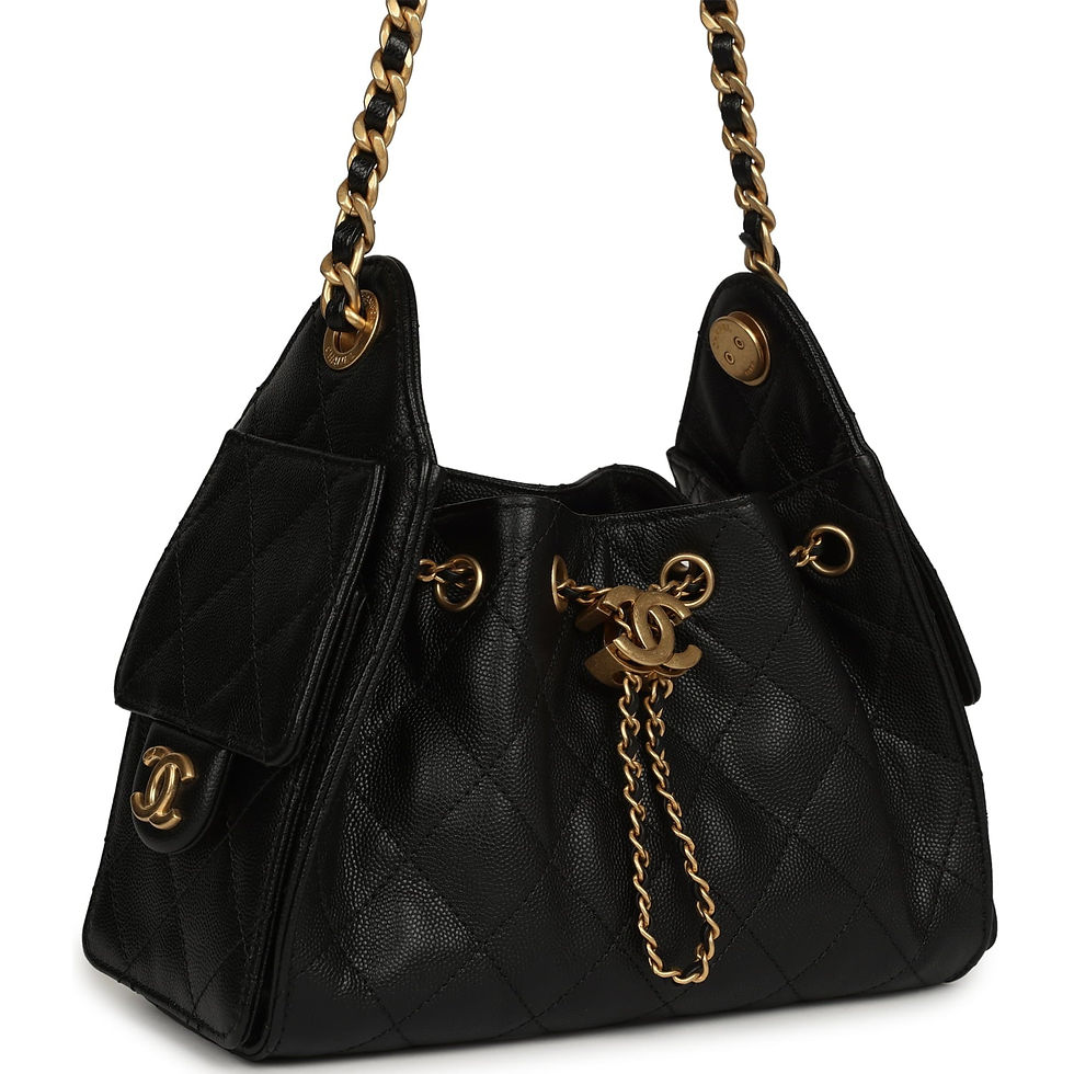 Three-quarter view of the black caviar mini hobo bag showing the side flap pocket
