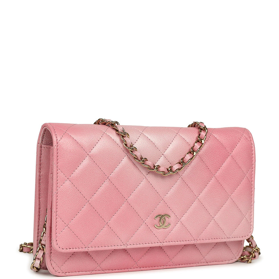 Three-quarter angle showing the pink ombré gradient and chain-and-leather strap