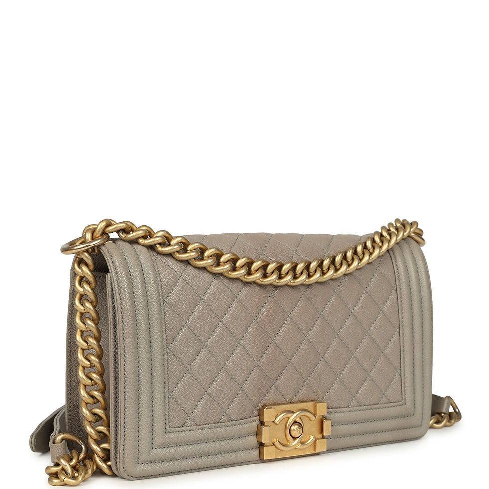 Three-quarter view of the taupe caviar Boy Bag showing the quilted flap and CC push-lock clasp