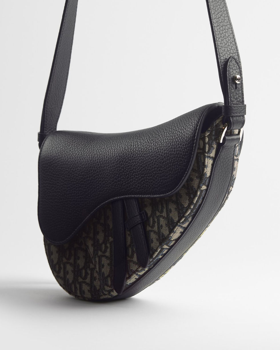 Thumbnail: Dior Saddle bag in Dior Oblique jacquard and Taurillon leather – angled close-up with strap