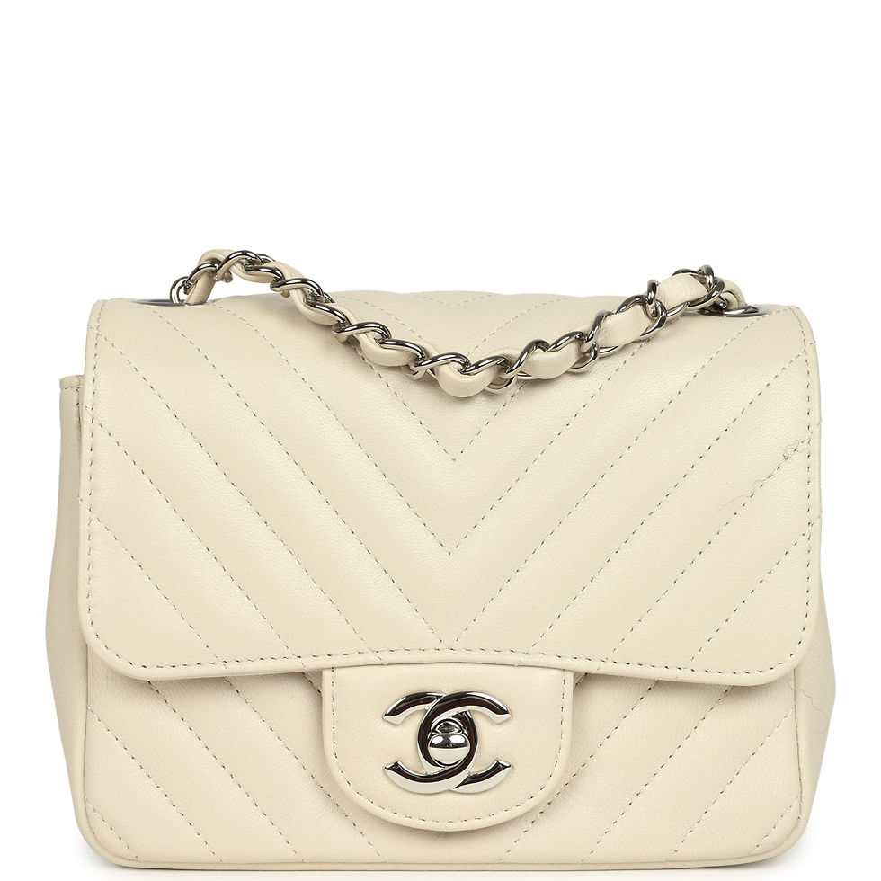 Front view of the Chanel Mini Chevron Square Flap Bag in ivory lambskin with silver CC turn-lock
