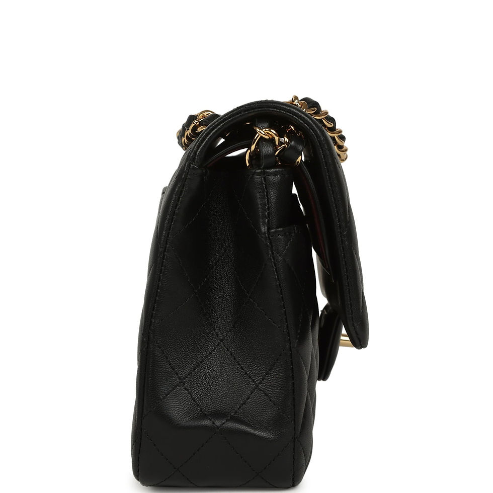Thumbnail: Profile view of the black Chanel Medium Flap showing the side gusset and gold chain strap