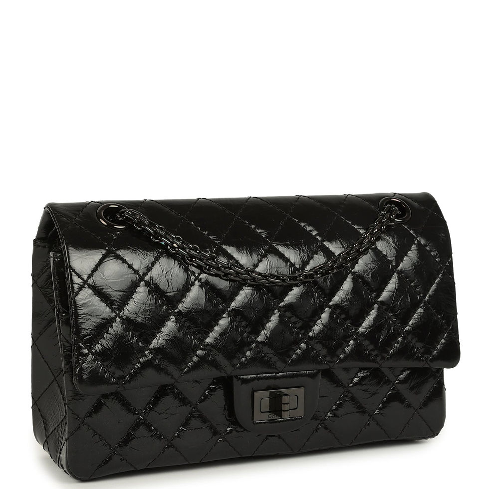 Three-quarter angled view showing the diamond-quilted crumpled calfskin and black-tone chain strap