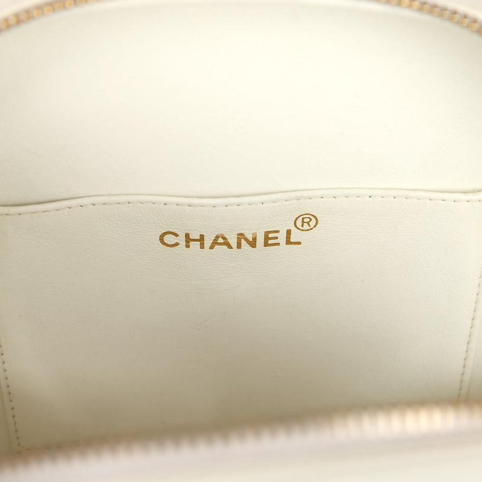 Thumbnail: Close-up of the Chanel stamp on the interior leather, without a country marking