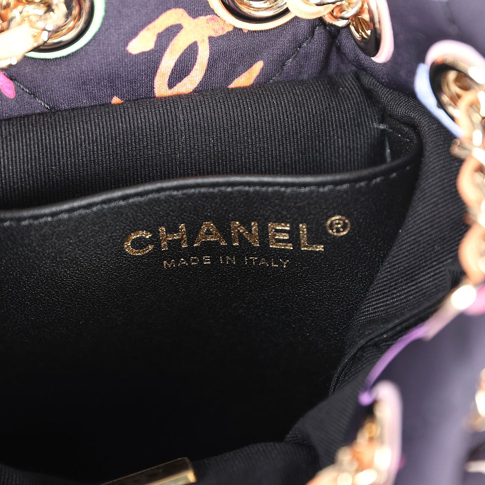 Thumbnail: Interior leather patch stamped Chanel Made in Italy inside the printed fabric backpack
