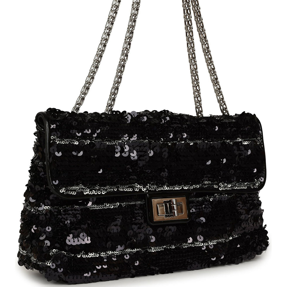 Three-quarter angled view showing the silver-striped sequin banding and Mademoiselle turn-lock