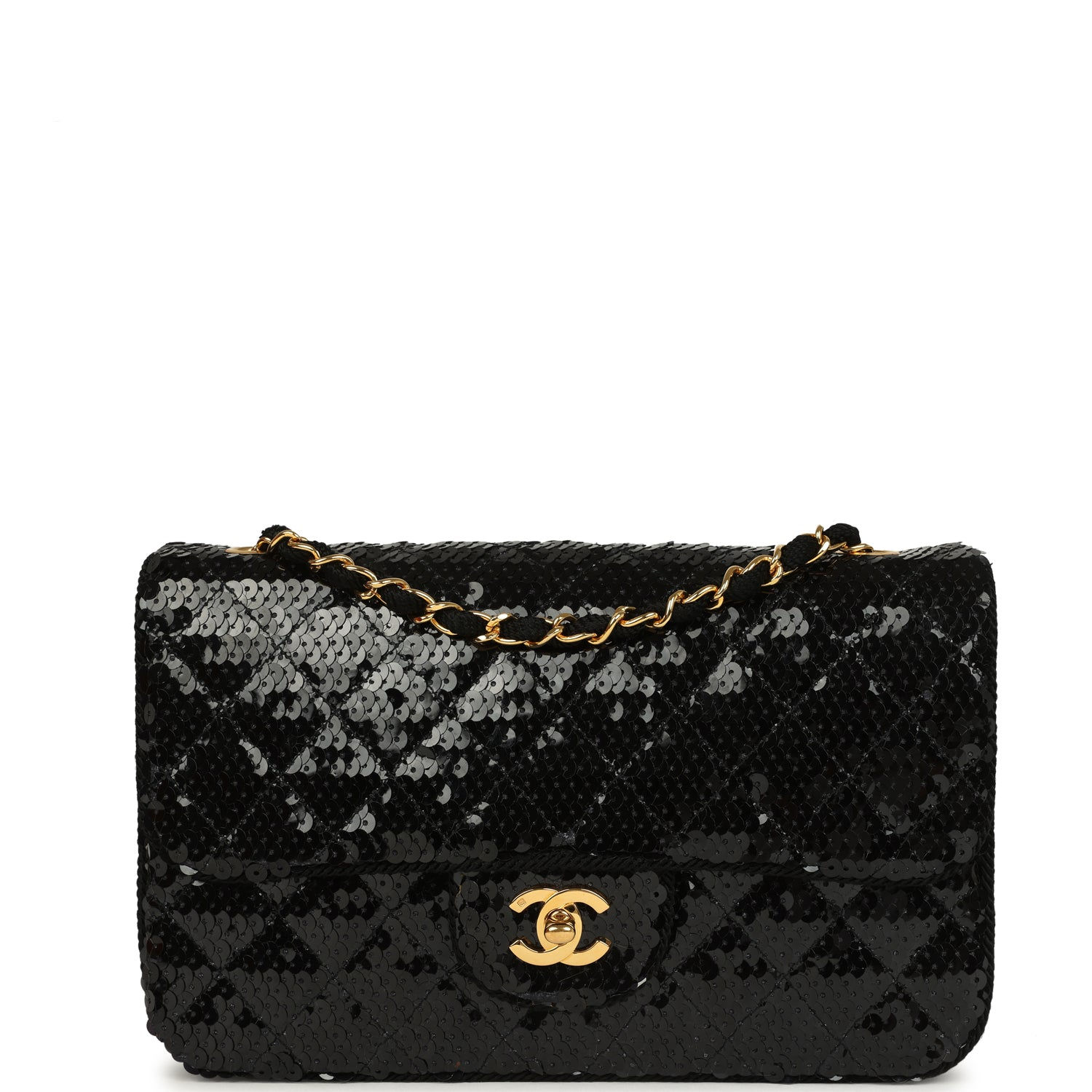 Front view of the vintage Chanel small flap bag in black sequin with a gold-tone CC turn-lock and chain strap