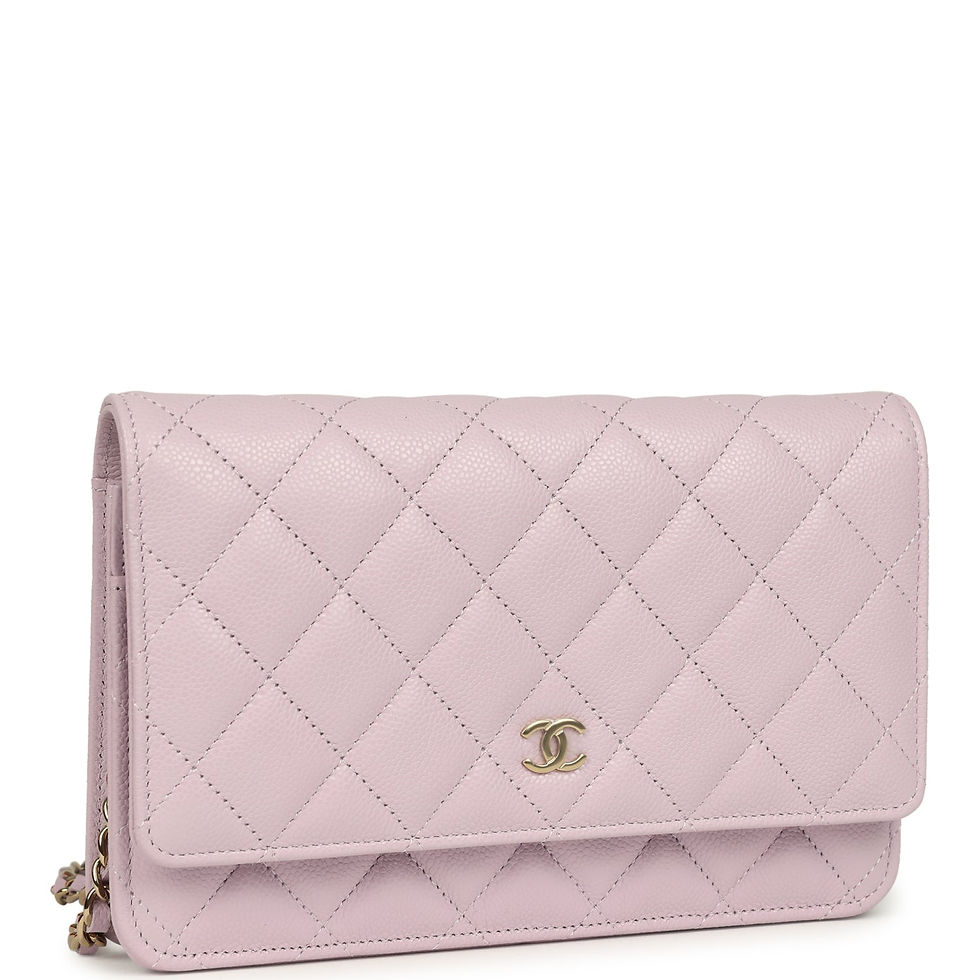 Three-quarter angle showing the quilted lilac caviar and light gold CC clasp