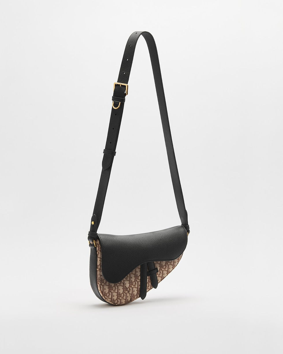 Thumbnail: Dior Saddle bag in brown Dior Oblique jacquard and Taurillon leather – three-quarter view with full strap