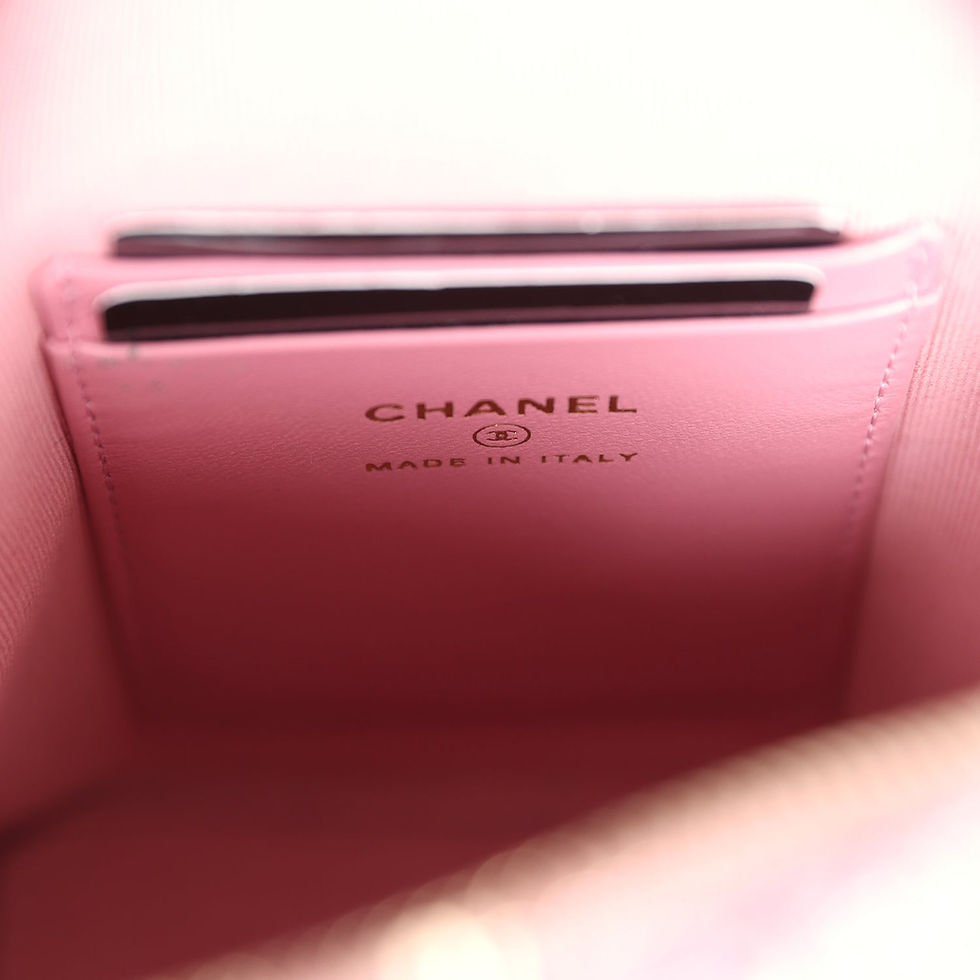 Thumbnail: Close-up of the gold-stamped Chanel Made in Italy signature on the interior card pocket