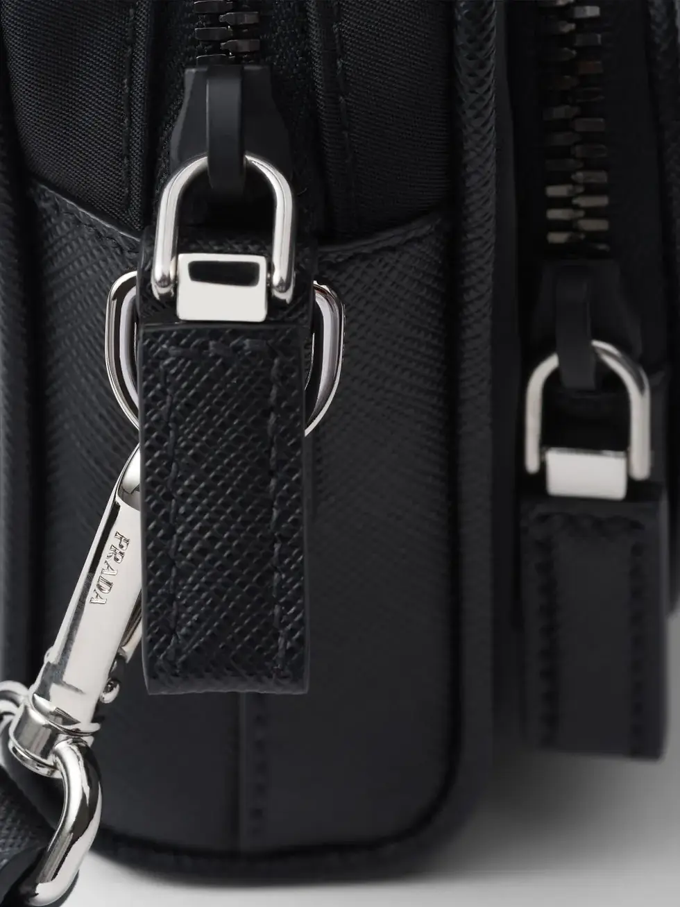Thumbnail: Black Prada Saffiano bag with adjustable nylon strap and metal hardware