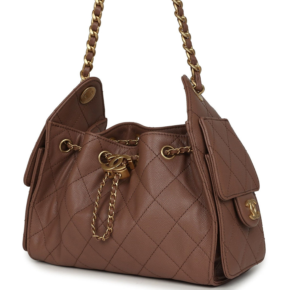 Thumbnail: Angled view of the hobo bag carried on its gold-tone chain shoulder straps