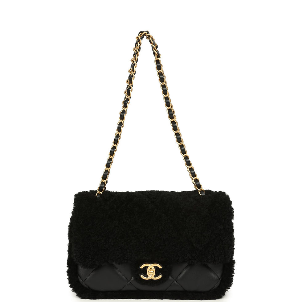 Thumbnail: Front view of the shearling flap bag suspended by its chain-and-leather strap