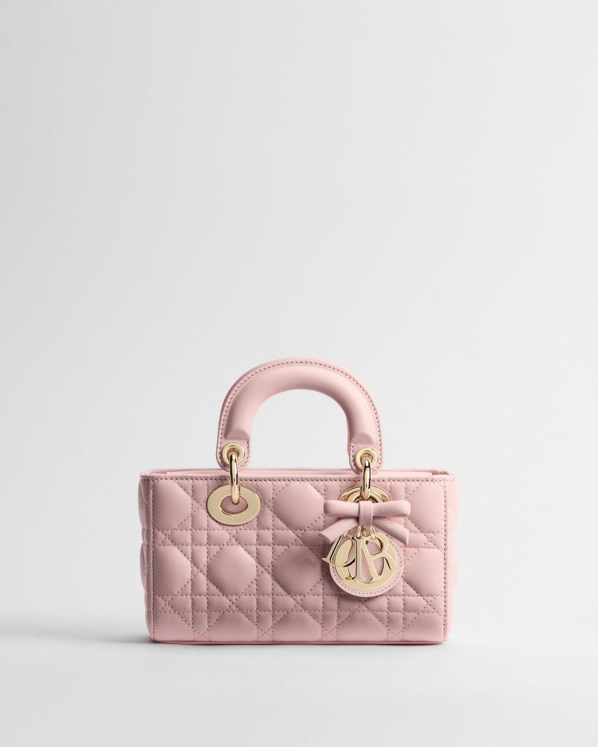 Dior Mini Lady D-Joy bag with bow in Soupir pink Cannage lambskin – front view