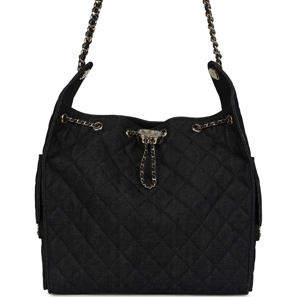 Front view of the dark blue denim Chanel 25 Medium bag with light gold hardware