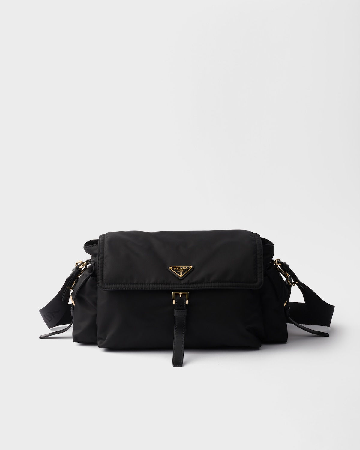 Prada Explore large shoulder bag with flap in black Re-Nylon – front view
