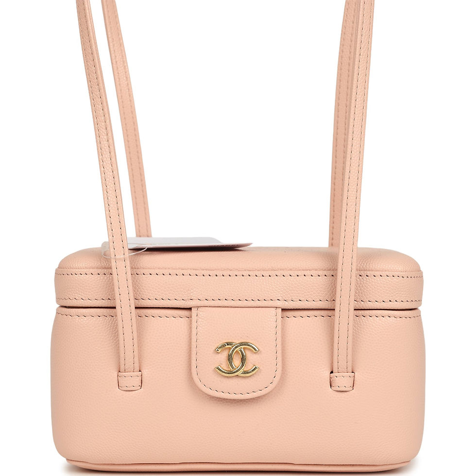 Front view of the Chanel Preppy Coco vanity case in light pink caviar with its retail tag attached