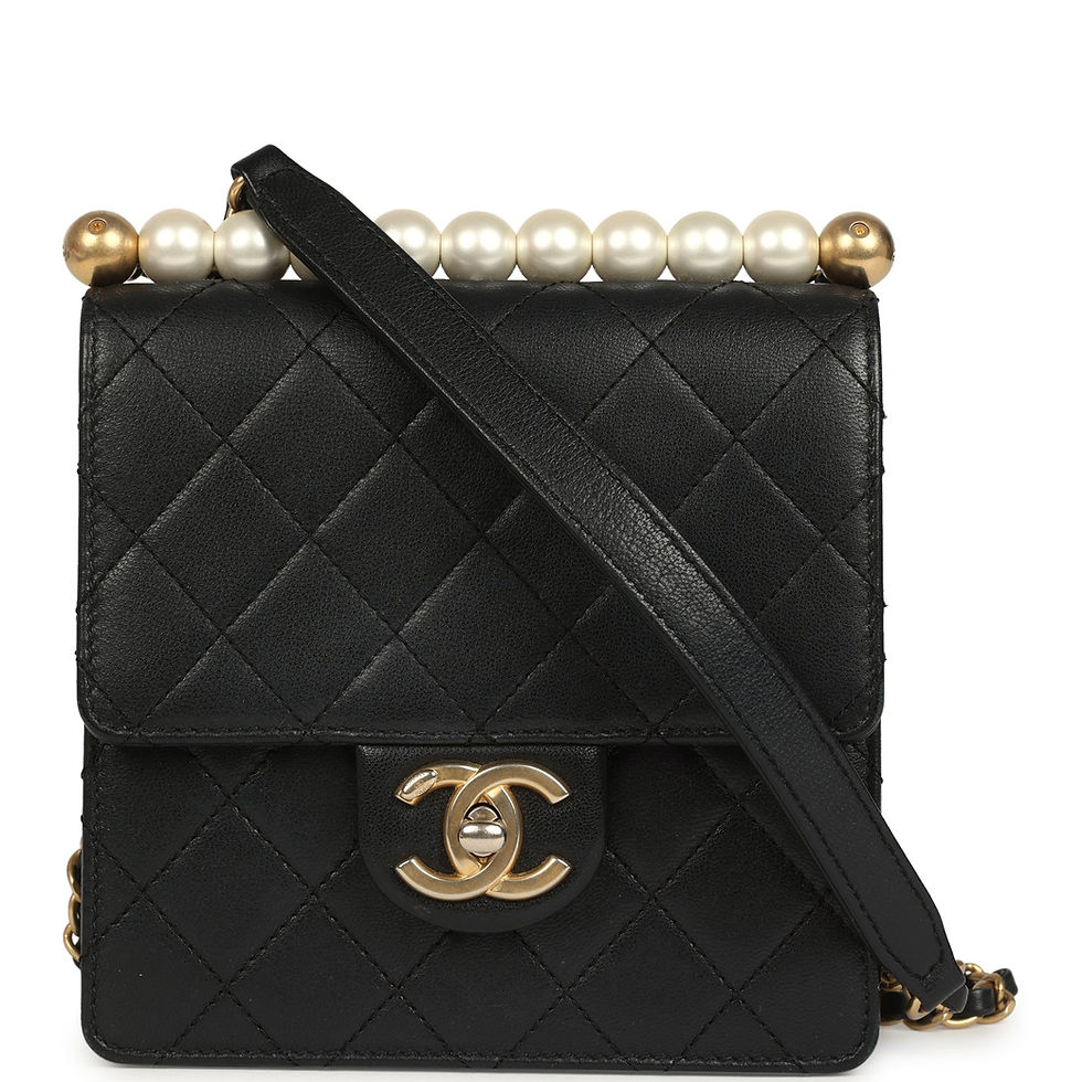 Front view of the Chanel Chic Pearls flap bag in black calfskin with a pearl-topped strap