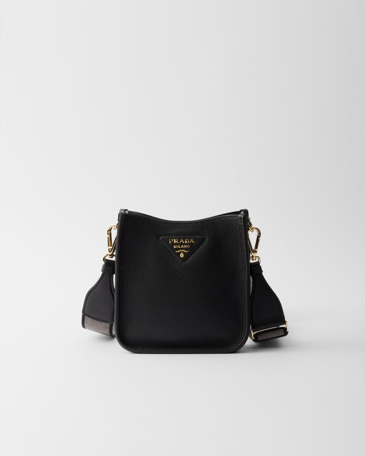 Prada mini flap shoulder bag in black calfskin – front view