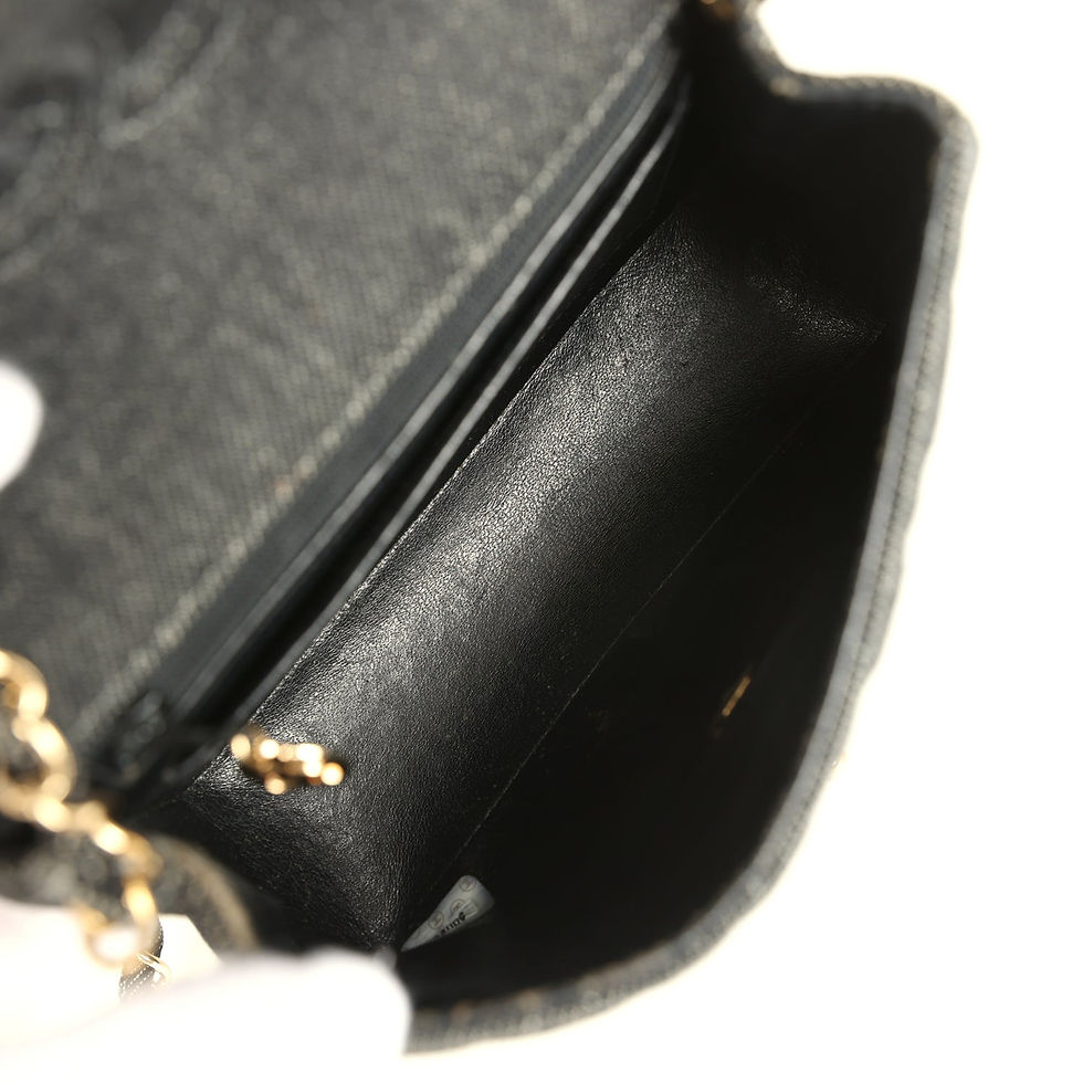 Thumbnail: Close-up interior view showing the black leather-lined zipped pocket