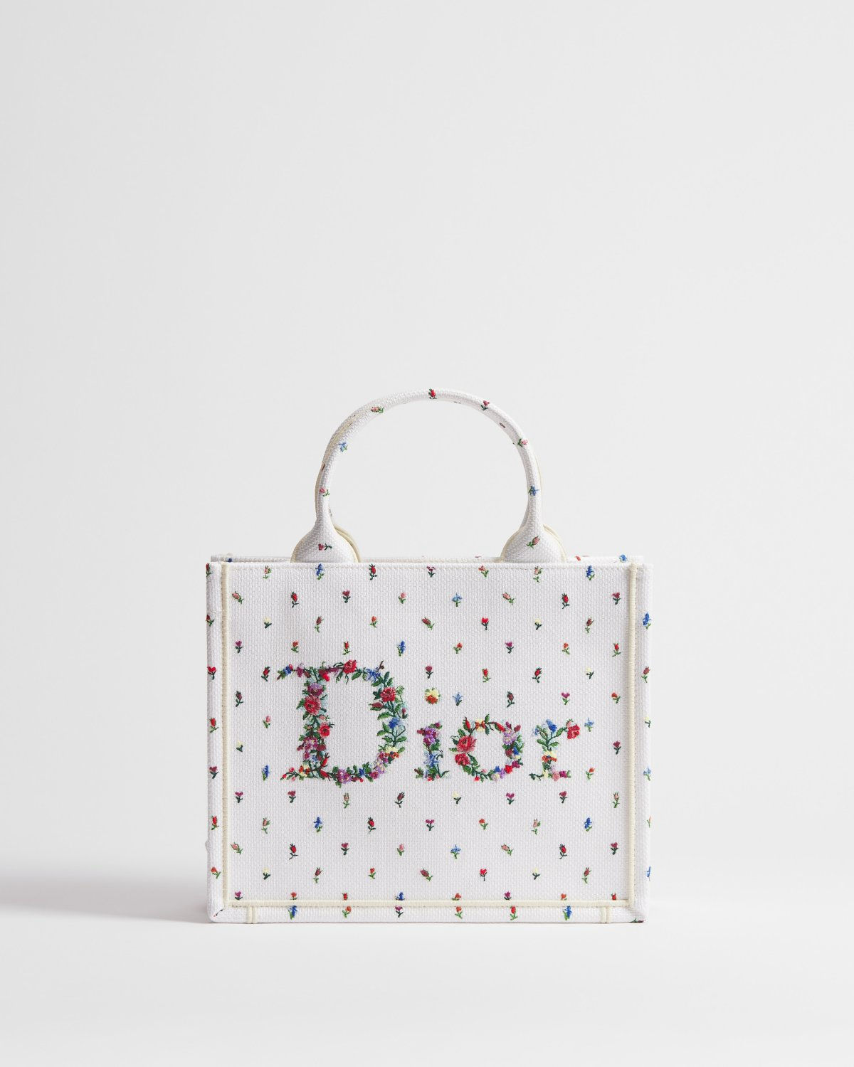 Dior Dioramour Small Book Tote with strap in white Revolution Flowers cotton – front view