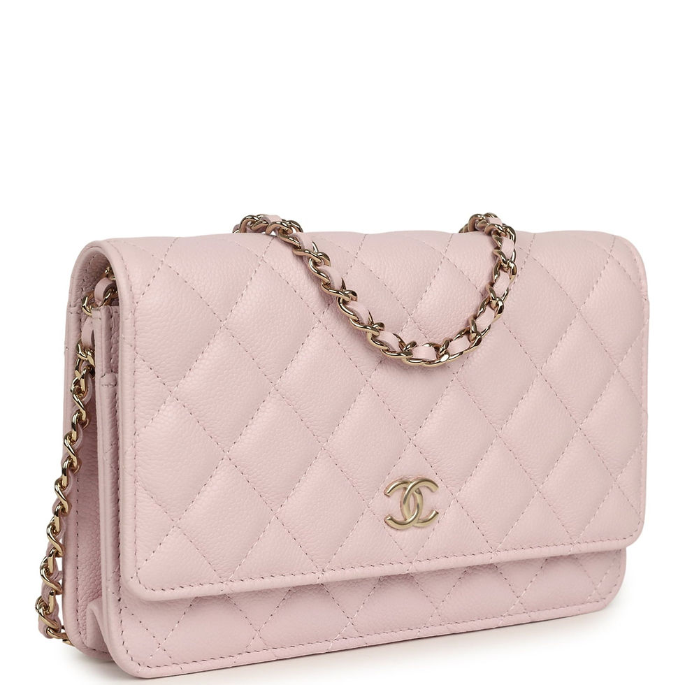 Three-quarter angle showing the quilted pink caviar and light gold CC clasp
