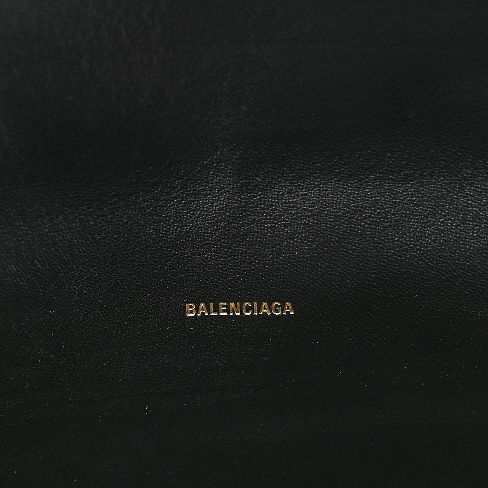 Thumbnail: Balenciaga Crush Sling, detail of gold B logo on front flap