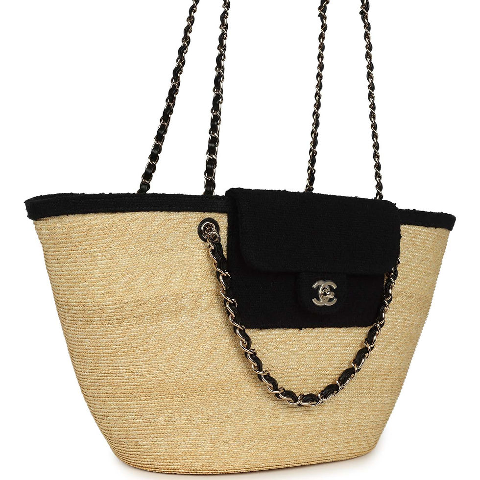 Three-quarter view of the tote showing the CC turnlock and chain-and-leather strap