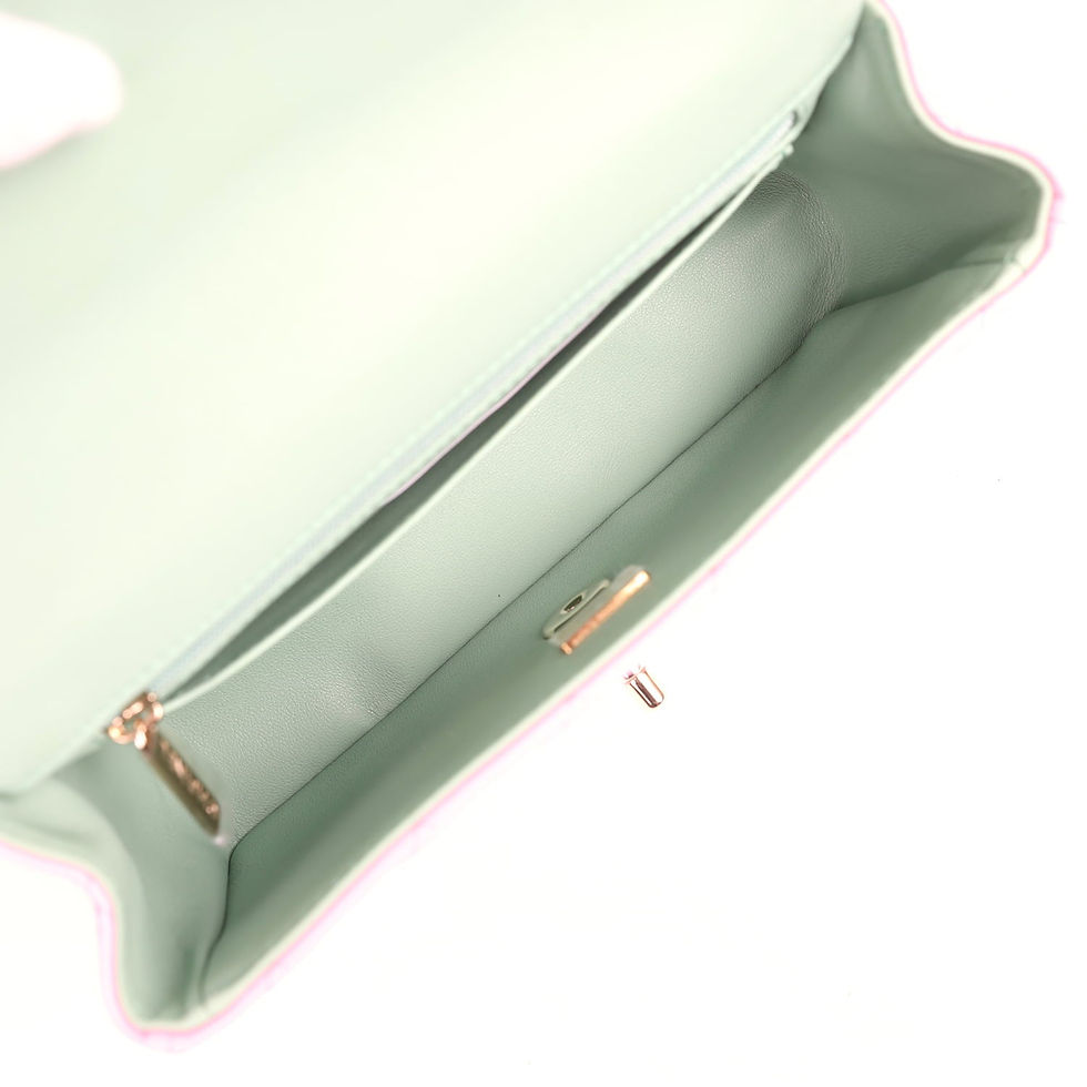 Thumbnail: Open interior of the bag showing the fully mint green leather lining