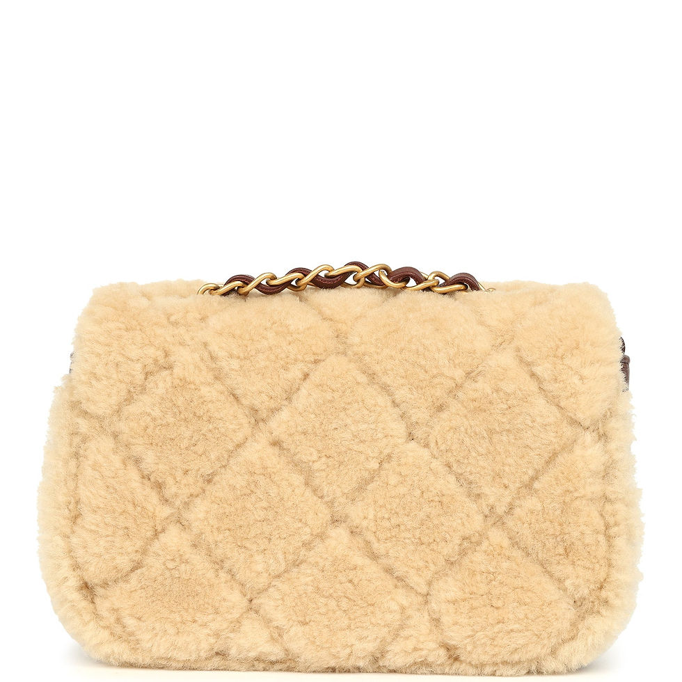 Thumbnail: Back view of the brown quilted lambskin body bordered by natural shearling trim
