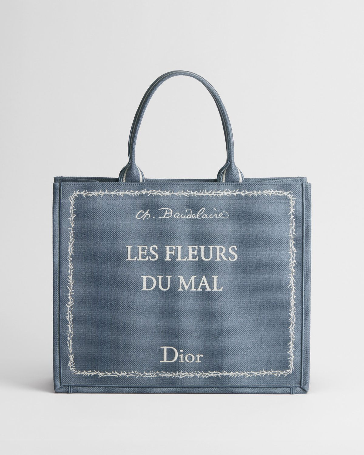 Dior Large Book Tote in blue embroidered canvas with Les Fleurs du Mal cover – front view