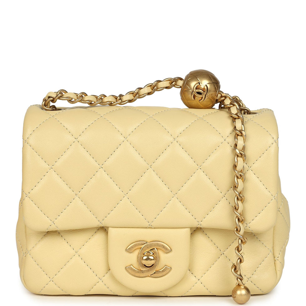 Front view of the Chanel Mini Pearl Crush Square Flap Bag in yellow lambskin with a gold CC turn-lock