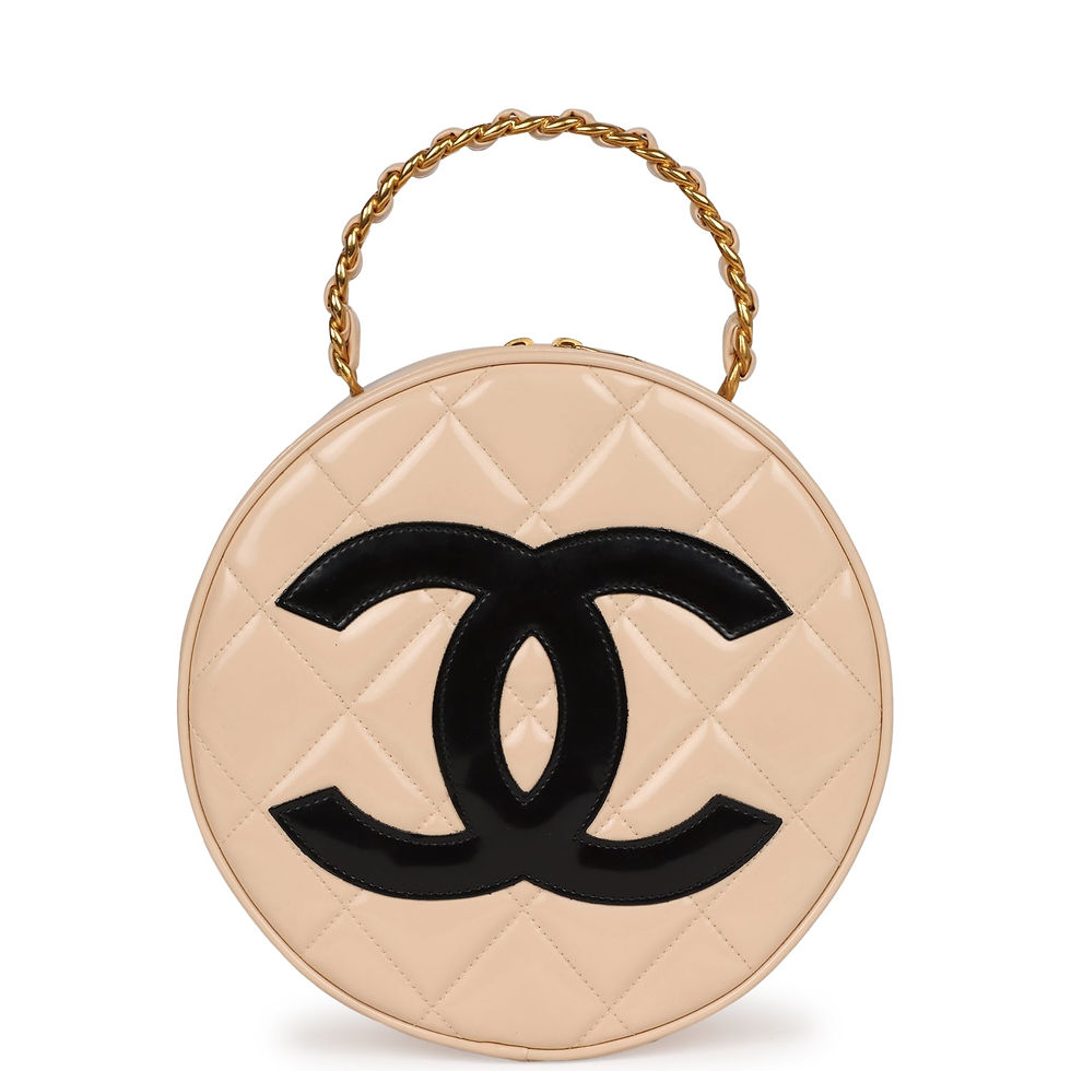 Front view of the round vanity bag in beige quilted patent leather with a black CC