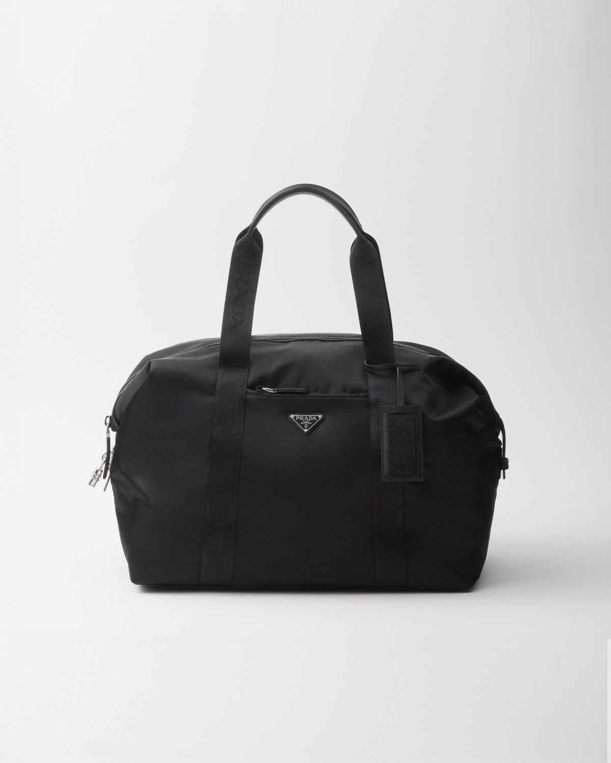Prada duffle bag in black Re-Nylon and Saffiano leather – front view