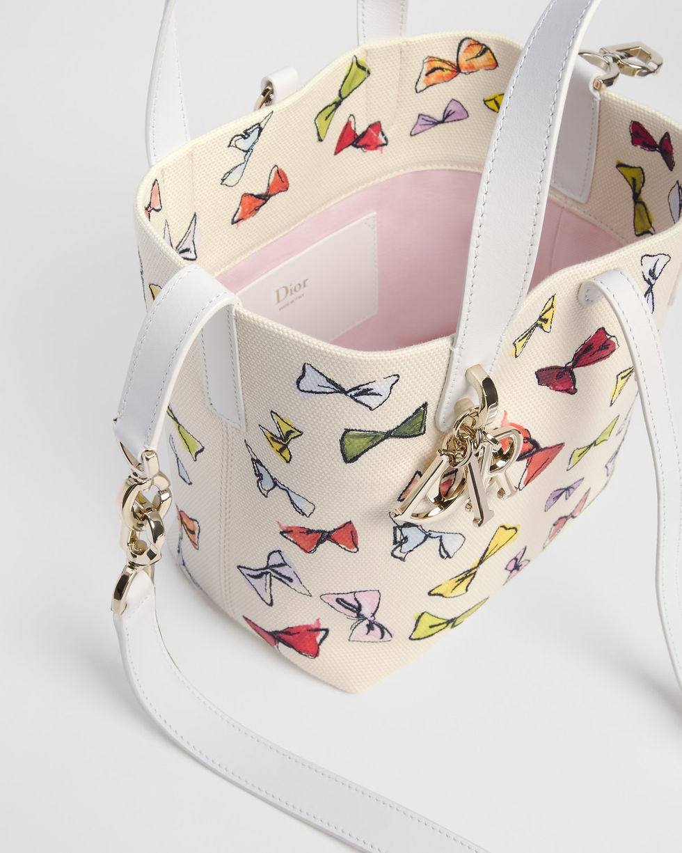 Thumbnail: Dior Dioriviera Small Toujours Vertical Tote in multicolor Dior Bows canvas – three-quarter view