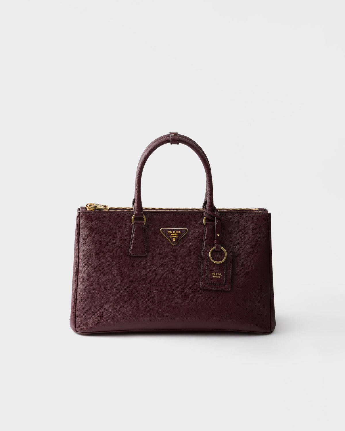 Prada Galleria large elongated bag in burgundy Saffiano leather – front view