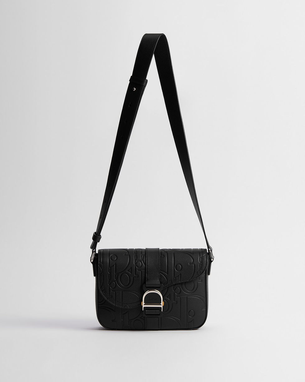 Dior Saddle Heritage messenger bag in black Dior Gravity leather – front view with strap