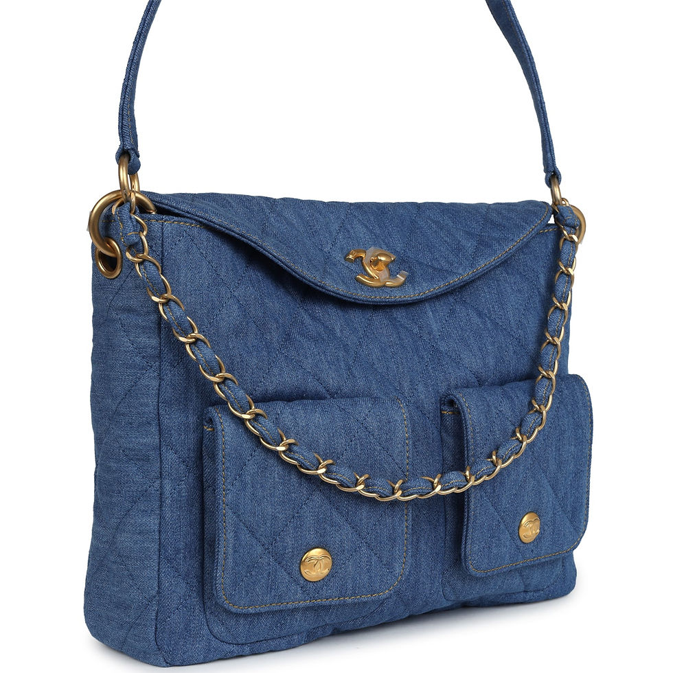 Side-angle view showing the bag's twin front pockets and chain-wrapped strap