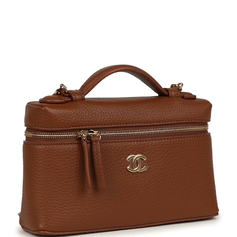 Three-quarter angled view of the camel calfskin vanity case showing the gold CC turnlock