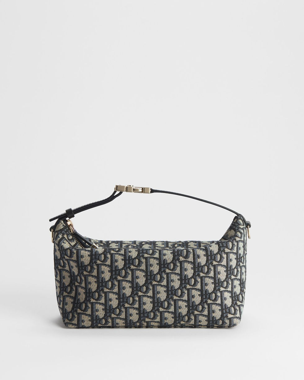Dior Medium DiorTravel Nomad Pouch in blue Dior Oblique jacquard – front view