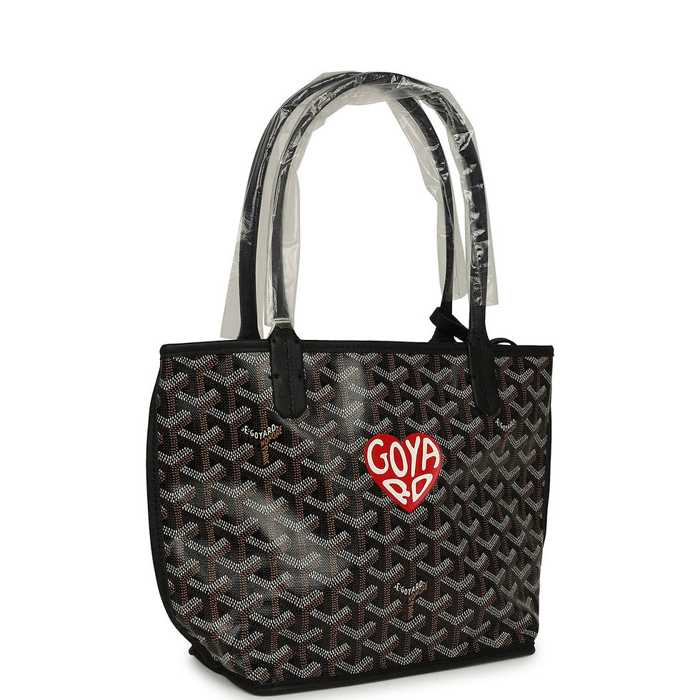 Goyard Anjou mini bag in Black Goyardine, three-quarter view with heart motif