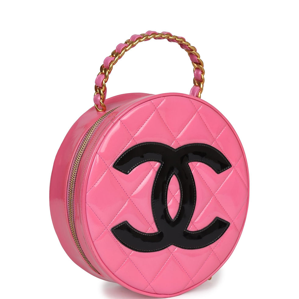Three-quarter angle showing the pink-and-gold woven chain handle and black CC
