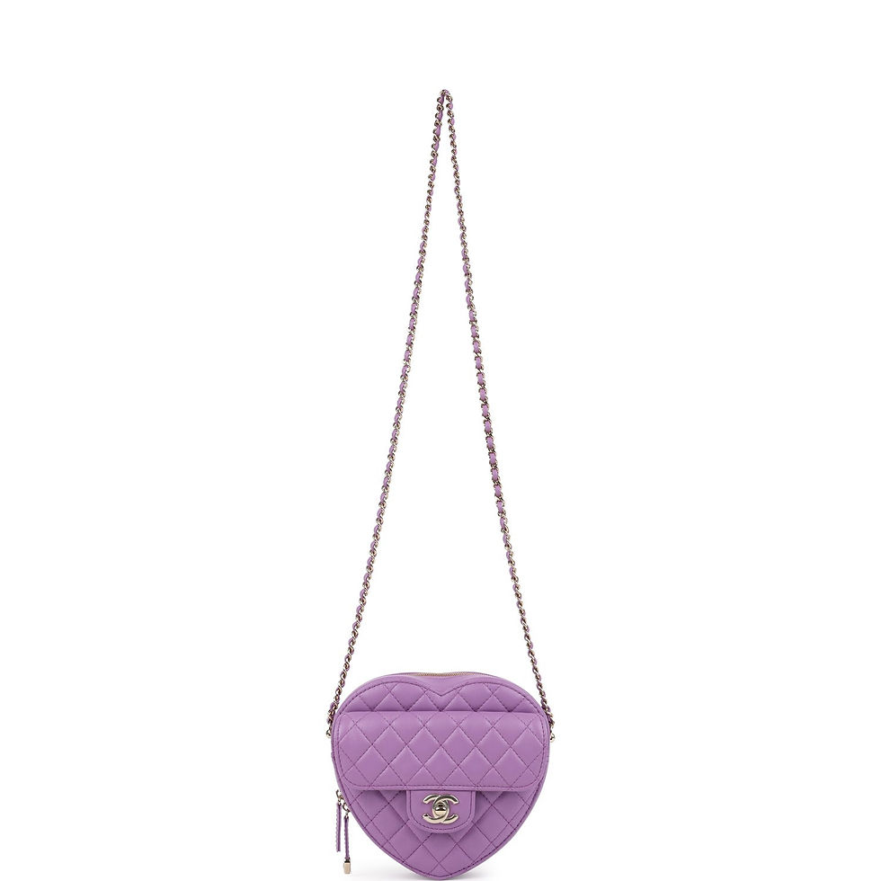 Thumbnail: Front view of the purple heart bag suspended by its chain-and-leather shoulder strap
